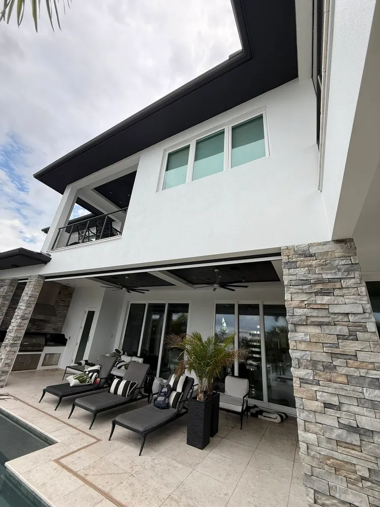 Clean home exterior after soft washing and exterior maintenance